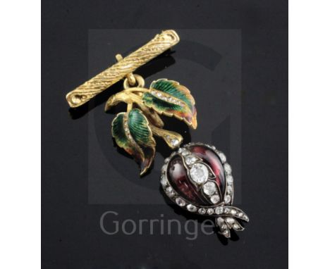 An early 19th century cabochon garnet and diamond mourning pendant with hairwork back and later enamelled 18ct gold suspensio