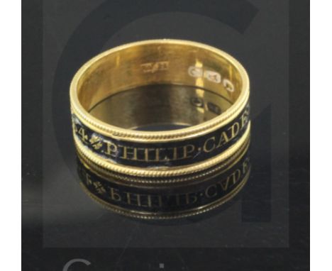 A George III 22ct gold and black enamel mourning band, inscribed "Philip Cade Esq, Ob. 27 Jan 1799 Aet 54", size Q.