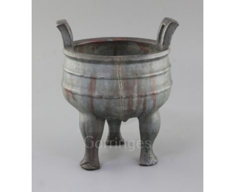 A Chinese Yixing pottery tripod censer, Ding, 18th century, decorated with a Jun type glaze, moulded four character seal mark