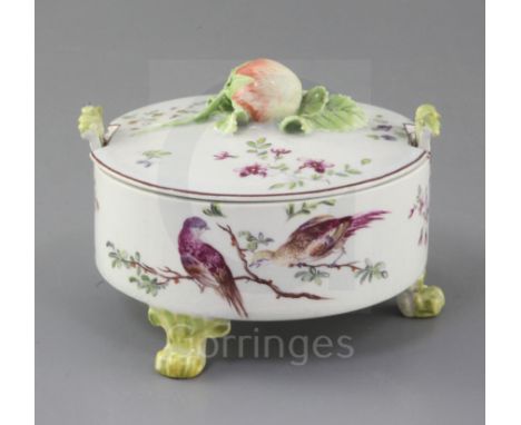 An early Derby butter tub and cover, c.1758, the drum-shaped body painted with two exotic birds on a branch, the reverse with