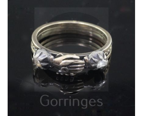 A George III gold, silver and rose cut diamond set gimmel fede ring, the clasped hands parting to reveal two hearts, size O/P