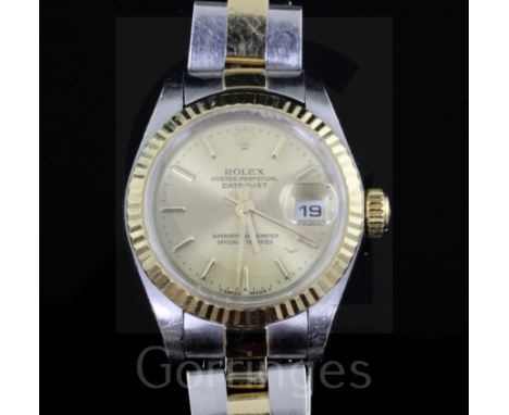 A lady's 2001 steel and gold Rolex Oyster Perpetual Datejust wrist watch, with yellow dial and baton numerals, model no. 7917