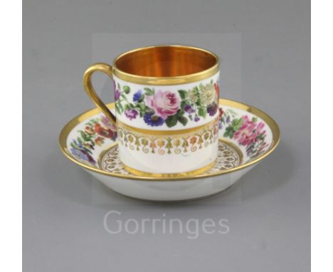 A Sevres porcelain coffee can and saucer, c.1820, each finely painted with a garland of flowers and a band of gilt lambequin,