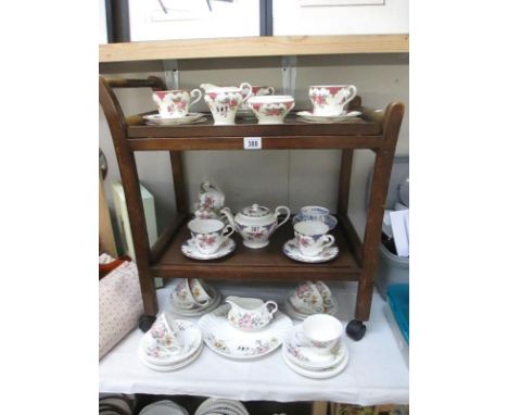 An assortment of Aynsley, Minton and Royal Doulton cups and saucers