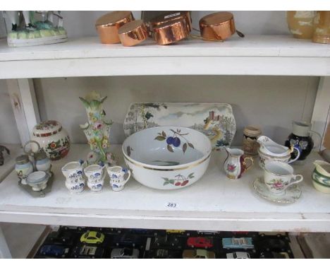 A shelf of misc. including a large Royal Worcester (Port Meirion style) bowl