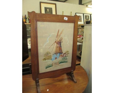 An oak frame tapestry fire screen depicting windmill