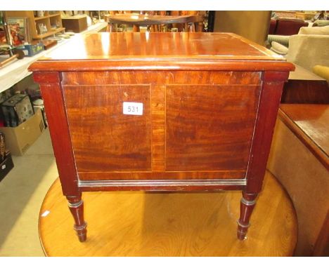 A wooden commode (missing liner)