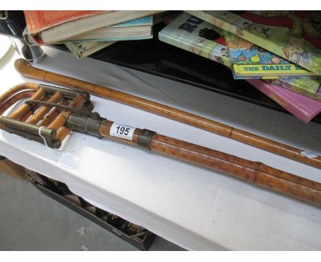 An early French bamboo shooting stick and 1 other
