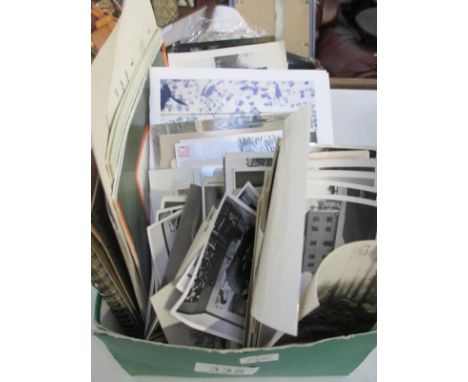 A mixed lot of old photographs, postcards, a sketch book etc.