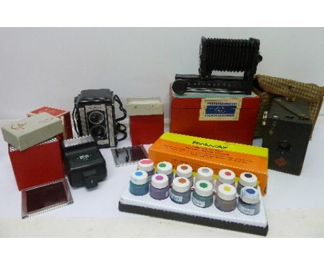 Ninety-six coloured glass slides, Helios Macro Bellows M42 fit, Sunpak flash, tinting dyes, Kodak Ducoflex camera and an Agfa