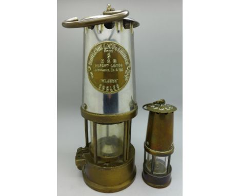 An Eccles miner's safety lamp and a small miner's lamp