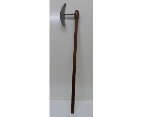 A Zulu battle axe, length of handle 78cm