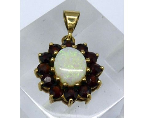 A 9ct gold, opal and garnet pendant, weight 3.1g