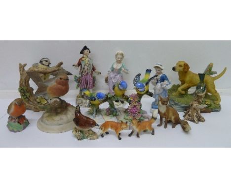 A Beswick bird, three continental figures, a Royal Worcester robin, 3197, and other animal figures