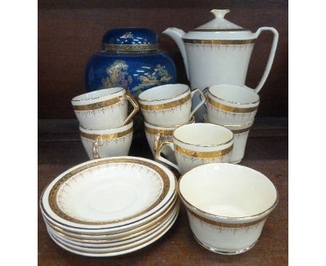 A Crown Devon Fielding's Modane coffee pot, six cups and saucers, a ginger jar, lid a/f, a sugar bowl and one other cup