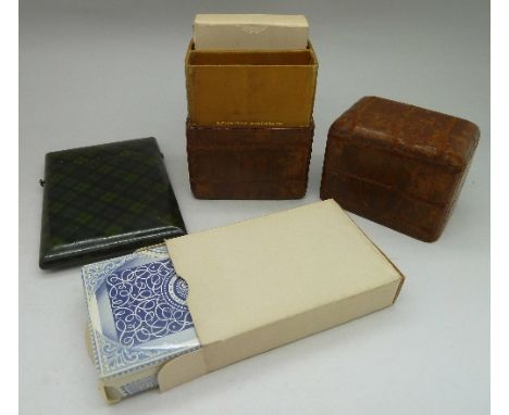 A tartan ware card case marked '42d or Sutherland' and a leather playing card box with two packs of cards, box marked Finniga
