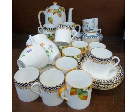A Foley China six setting coffee service, six Salisbury China cups and saucers, six Shelley coffee cans and saucers and a Poo