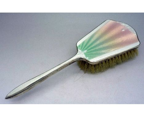 A silver and enamel brush