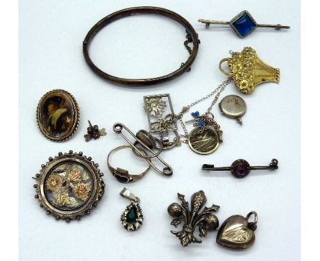 Six silver brooches, two lacking pins, a silver bangle, three pendants, etc.