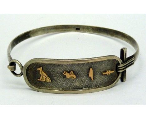 A white metal bangle