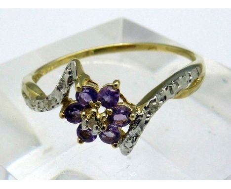 A 9ct gold, diamond and amethyst ring, weight 1.1g, size O