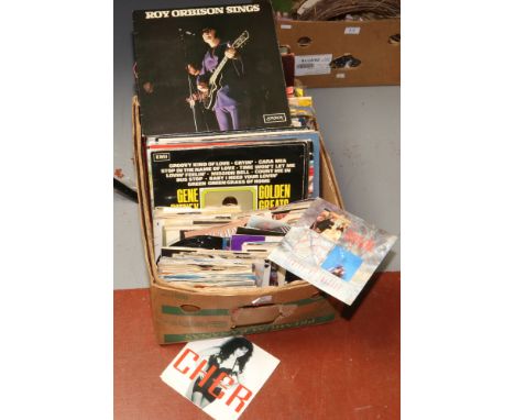 A collection of single records, some in original sleeves along with various L.Ps rock and pop and a selection of old 78 rpm r