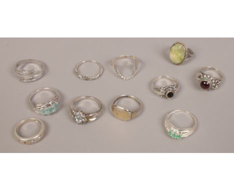Eleven vintage silver dress rings including hardstone and gem set examples. 