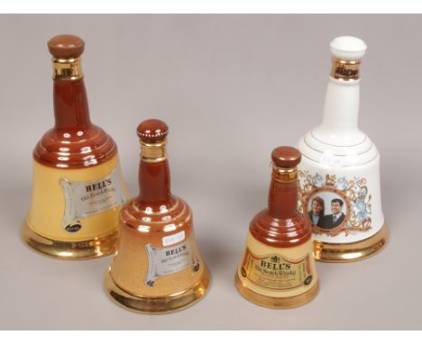 A collection of Bells Old Scotch Whisky ceramic decanters to include commemorative marriage of Prince Andrew and Sarah Fergus