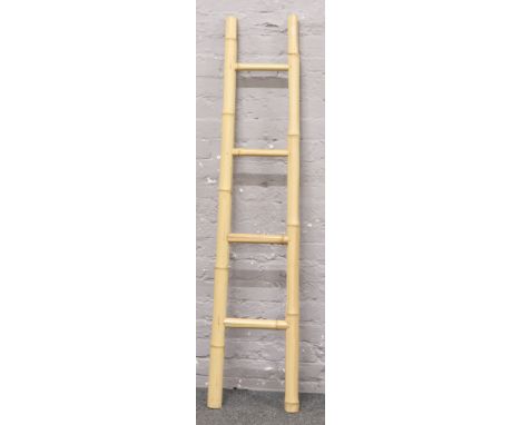A bamboo four rung ladder height 161cm. 