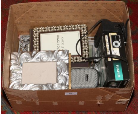 A box of miscellaneous mainly photo frames to include Fujifilm digital camera Finepix J32 and Kodak Instamatic camera etc. 