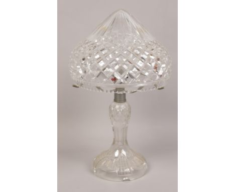 A cut glass table lamp. 