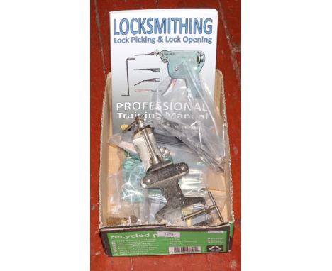 Locksmithing; lock picking and lock opening professional training manual and associated tools. 