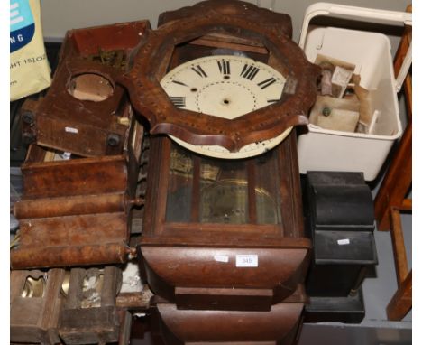A collection of wooden wall clock cases, two marble mantel clock cases, spare parts etc. 