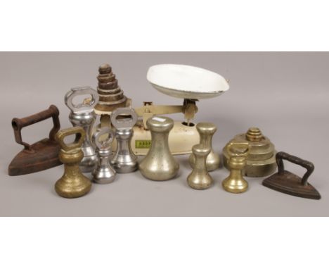 Harper kitchen weighing scales with an assortment of weights to include T. Sheldon &amp; Co. cast iron No. 4 and smaller flat