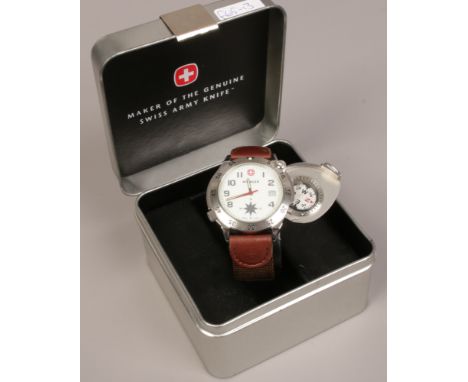 A Wenger boxed quartz wristwatch with integrated compass. 