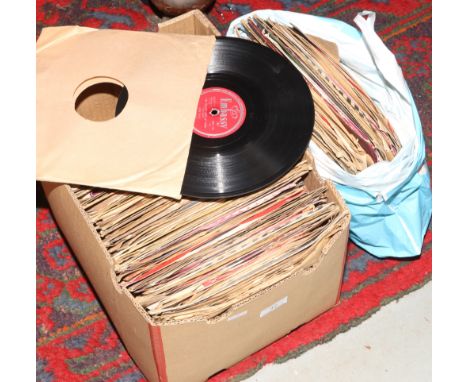 A box and a bag of vintage 78 rpm records to include Pat Boone, The Ray Burns, Lonnie Donegan etc. 