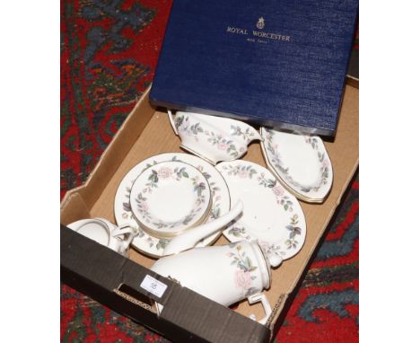 A box of Royal Worcester June Garland bone china tea and dinnerwares to include boxed plate. 