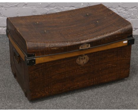 A twin handled tin trunk. 