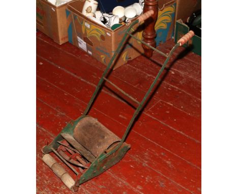 A child's vintage Webb lawn mower with roller. 