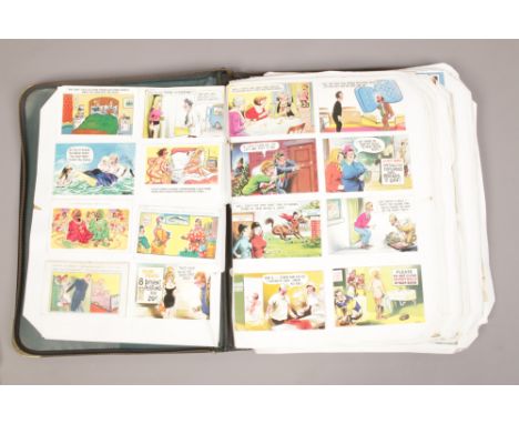 A well filled album of over 600 saucy postcards, some vintage and including Bamforth. 