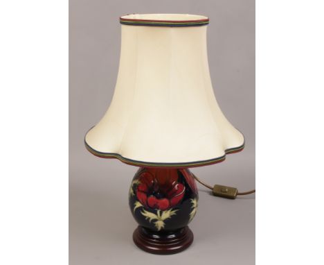 A Moorcroft table lamp in the Anemone pattern. 