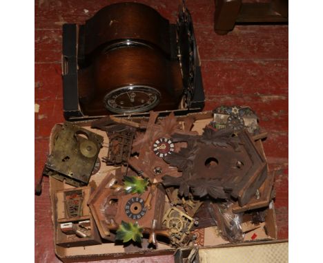Two boxes of clocks and clock parts to include oak dome top mantle clocks, cuckoo clocks, Smiths wall clock etc. 