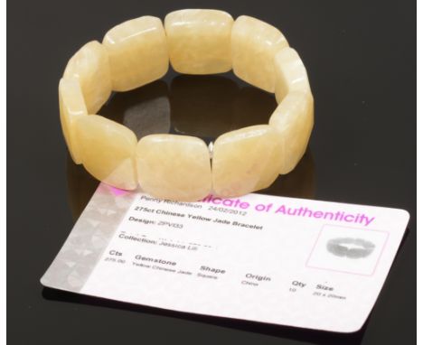 A Chinese yellow jade bracelet 275ct with 10 20 x 20mm faceted square cut tablets and certificates of authenticity. 