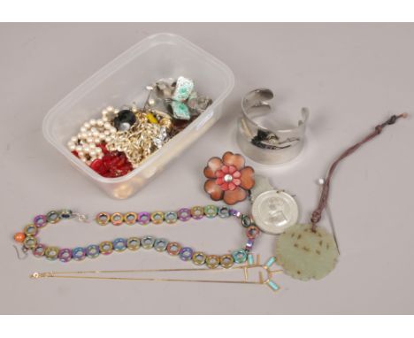 A box of costume jewellery and collectables including Fiorelli bangle, jade coloured pendant, Victorian Sunday School model e