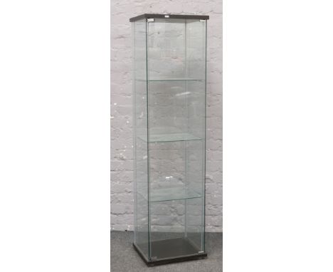 A tall standing toughened glass four shelf display cabinet 163cm x 40cm x 35cm. 