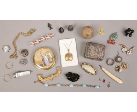 A box of collectables including compact, Japanese antimony box, vintage golf box, cigar cutter and cufflinks etc. 
