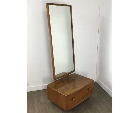 ERCOL, WINDSOR MODEL 406 ELM CHEVAL MIRROR CIRCA 1960-69 with adjustable plate, the base fitted with single drawer, retaining