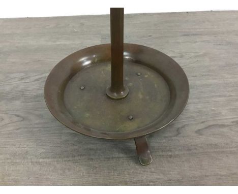 PATINATED BRASS FLOORSTANDING PRICKET CANDLESTICK EARLY 20TH CENTURY&nbsp; with circular drip pan on column support to circul