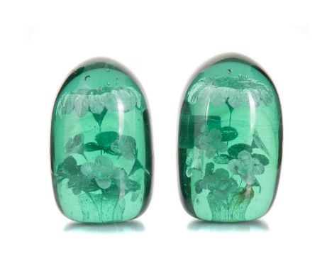 TWO VICTORIAN GREEN GLASS DUMP PAPERWEIGHTS LATE 19TH CENTURY both with internal foliate decoration, rough pontil scarthe lar