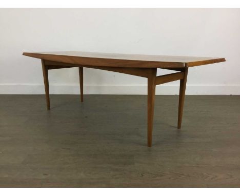 TREVOR CHINN FOR GORDON RUSSELL LTD. OF BROADWAY, TEAK COFFEE TABLE CIRCA 1960-69 raised on tapered supports, bearing label40